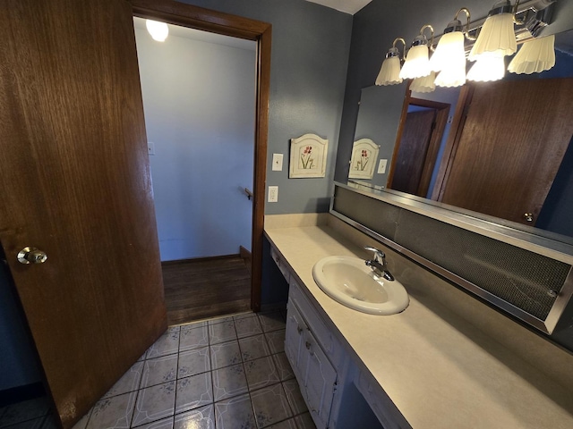 bathroom featuring tile patterned floors and vanity