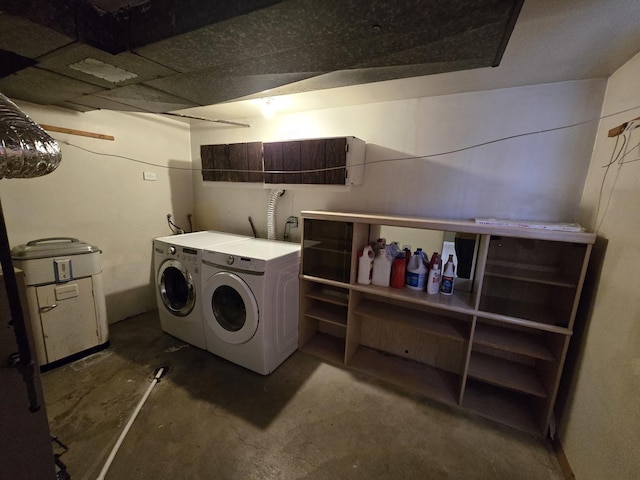 laundry area featuring washer and clothes dryer