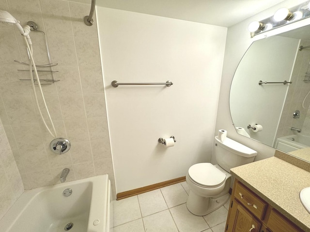 full bathroom featuring vanity, tiled shower / bath combo, tile patterned floors, and toilet