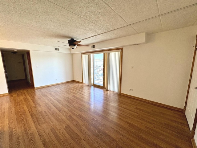 unfurnished room featuring ceiling fan and hardwood / wood-style floors