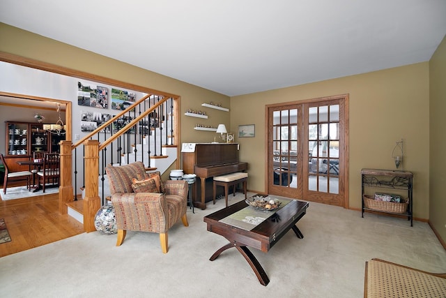 living room with french doors and light colored carpet