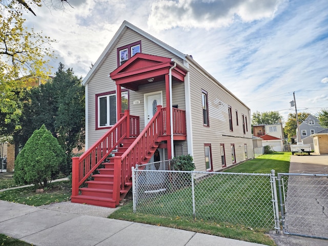 view of front of property with a front lawn