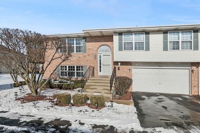 split foyer home featuring a garage