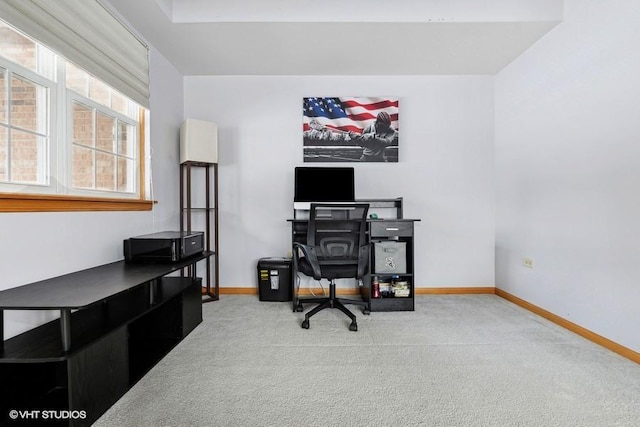 office area featuring light colored carpet