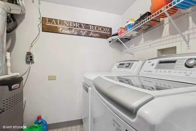 laundry room with washer and clothes dryer