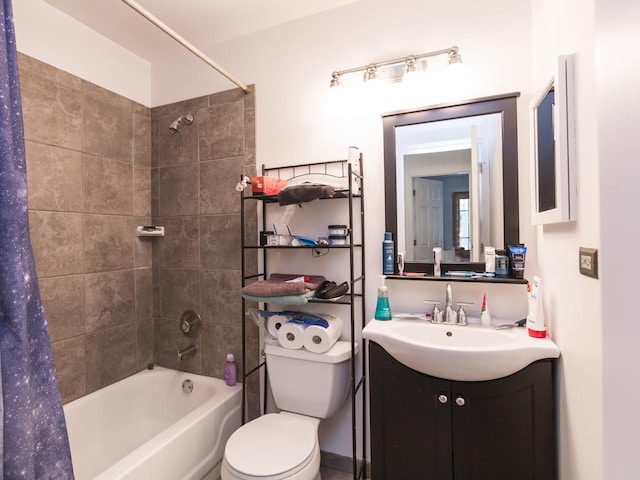 full bathroom featuring toilet, vanity, and shower / bath combination with curtain