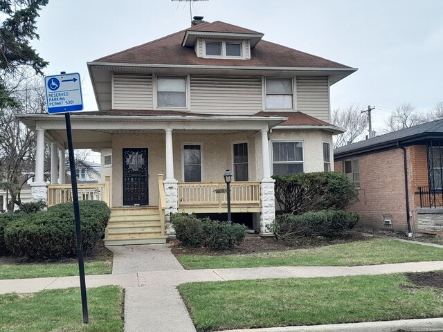 view of side of home featuring a yard