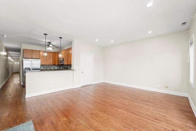 empty room with dark hardwood / wood-style floors