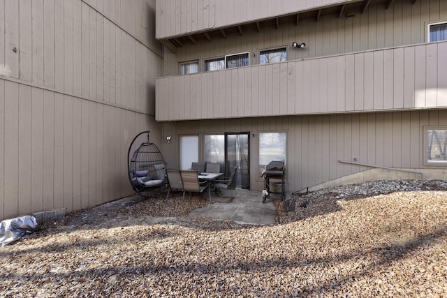 doorway to property featuring a patio area and a balcony