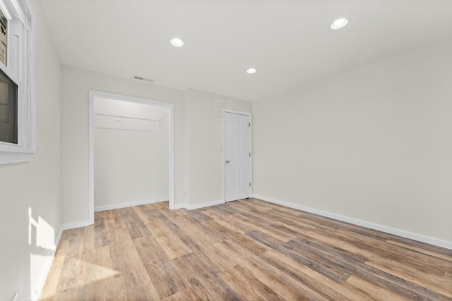 unfurnished bedroom featuring light hardwood / wood-style flooring