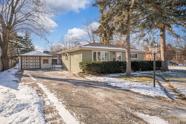 ranch-style home featuring a garage