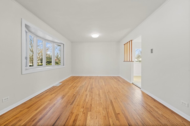 unfurnished room featuring light wood-type flooring