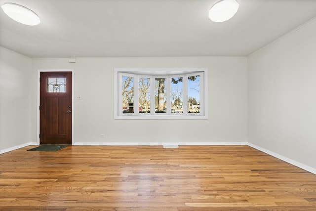 entrance foyer featuring light wood-type flooring