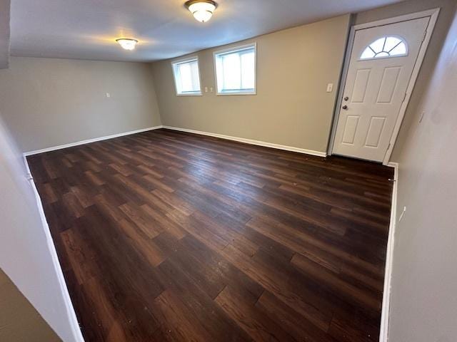 foyer with dark hardwood / wood-style floors