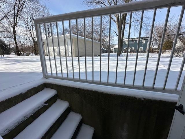 view of yard layered in snow