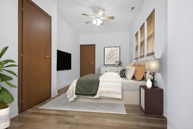 bedroom featuring ceiling fan and light wood-type flooring