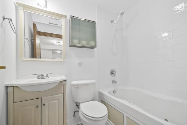 full bathroom featuring toilet, vanity, and tiled shower / bath