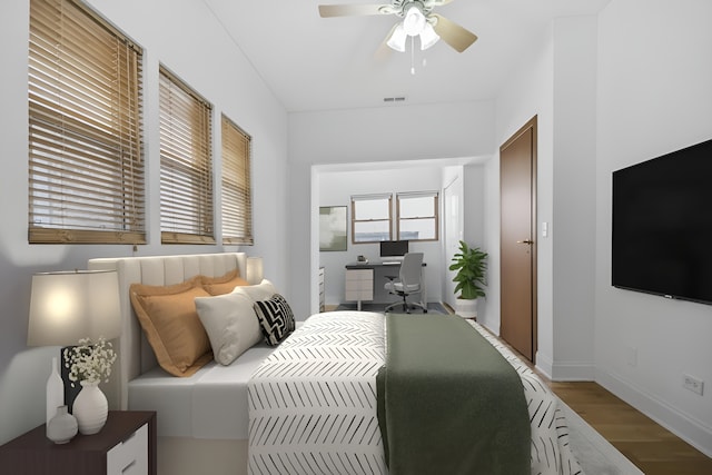 bedroom featuring ceiling fan and wood-type flooring