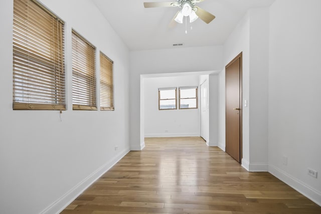 hall with light hardwood / wood-style flooring