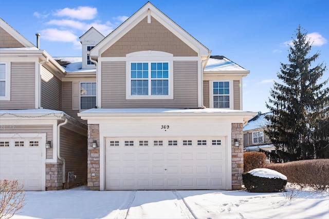 view of front of home with a garage