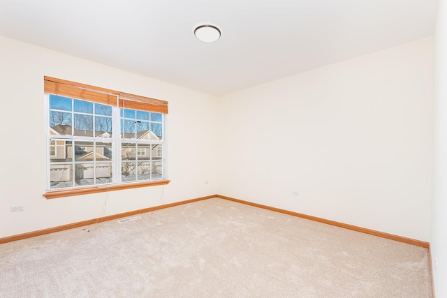 view of carpeted spare room