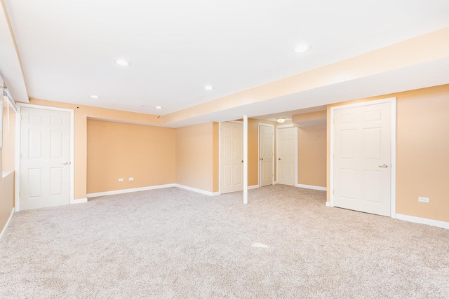 basement with carpet flooring