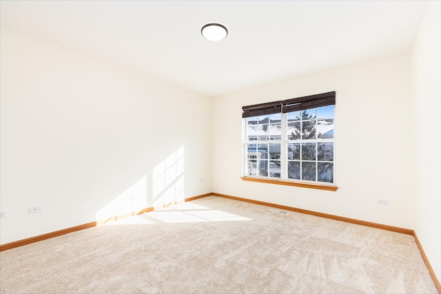 view of carpeted spare room