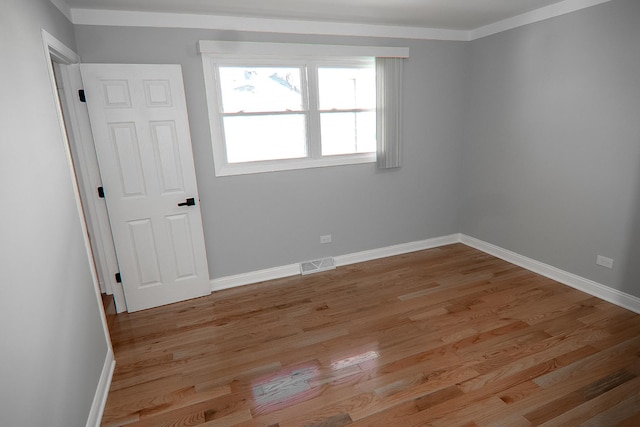 unfurnished room featuring light wood-type flooring