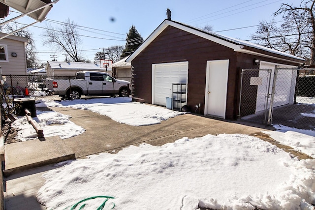 view of snow covered garage