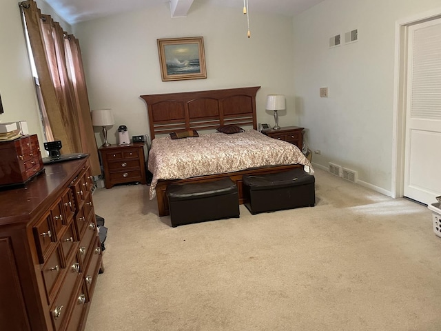 bedroom featuring light colored carpet