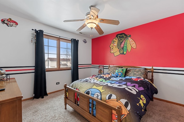 bedroom featuring light colored carpet and ceiling fan