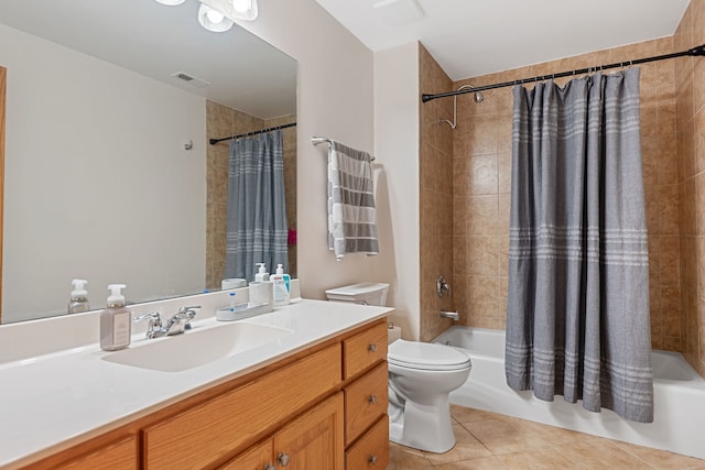 full bathroom with toilet, shower / tub combo, tile patterned floors, and vanity