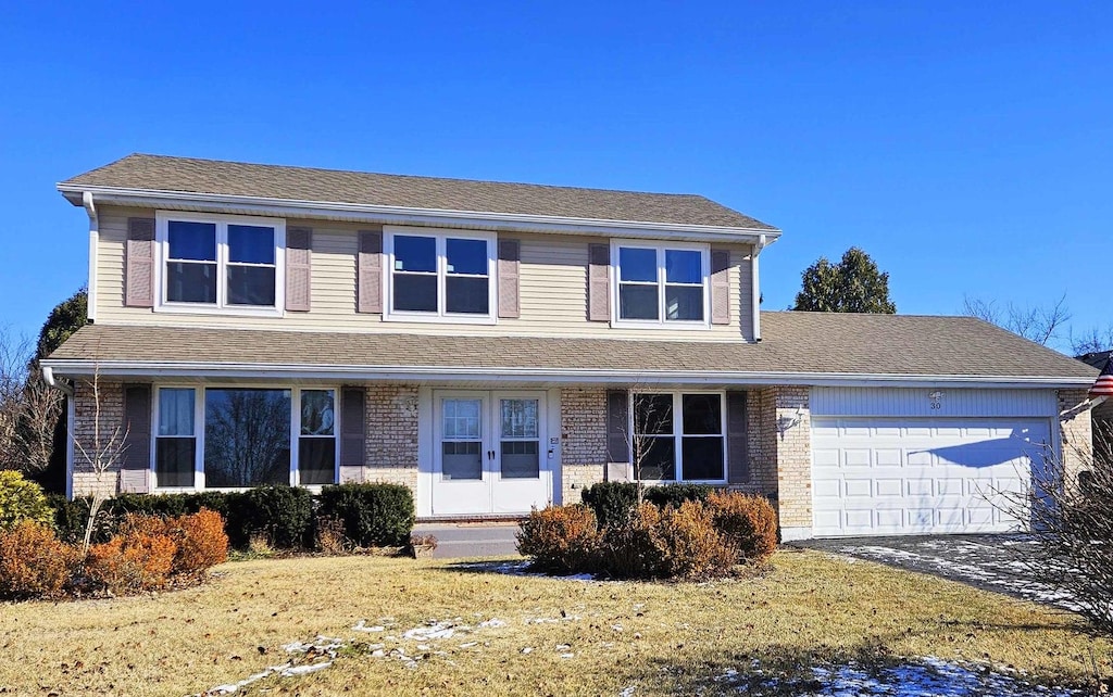 view of front property with a garage