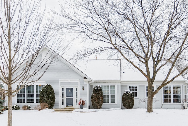 view of snow covered property