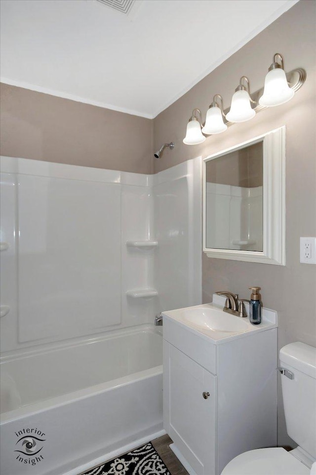 full bathroom with toilet, shower / washtub combination, and vanity