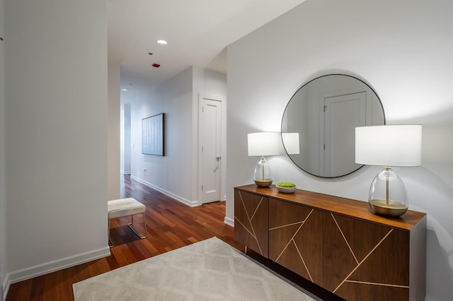 hallway featuring dark wood-type flooring