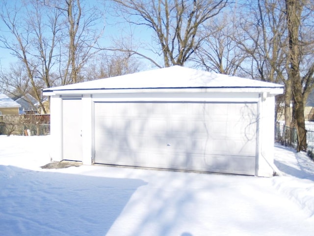 view of snow covered garage