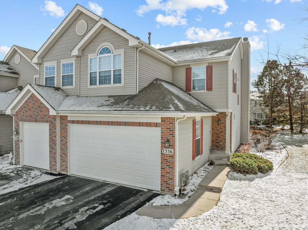 front of property featuring a garage