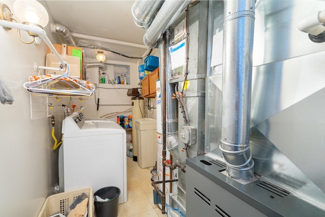 utility room with washer and dryer