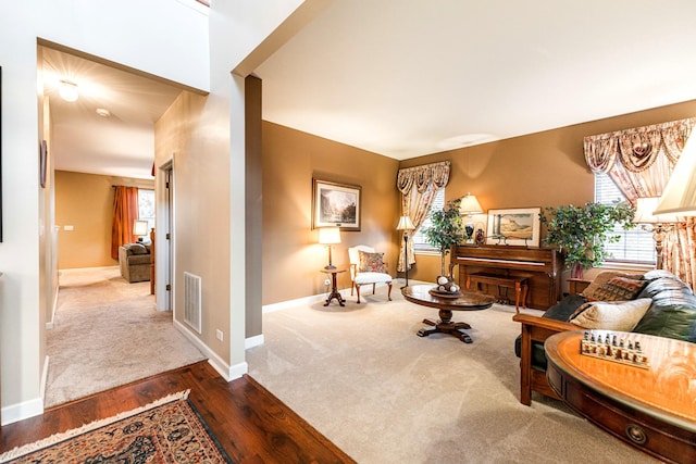 sitting room with carpet floors