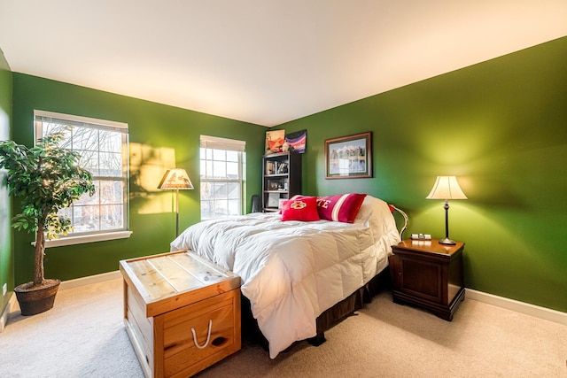 bedroom with light carpet