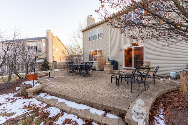 view of snow covered patio