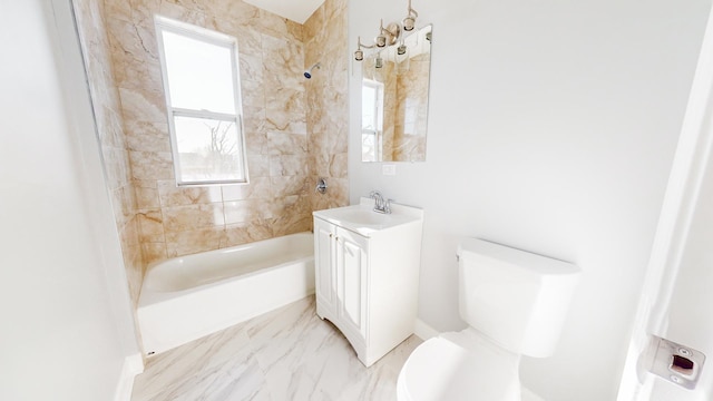 full bathroom featuring tiled shower / bath combo, vanity, and toilet