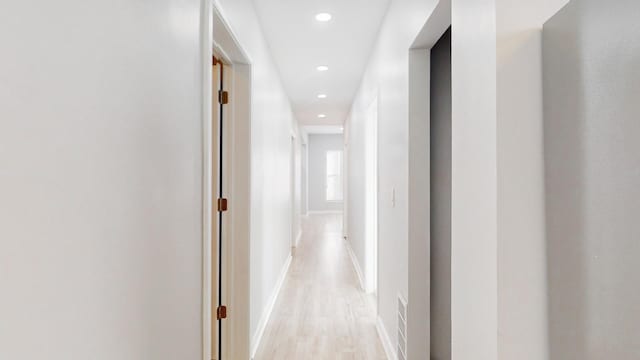 corridor featuring light wood-type flooring