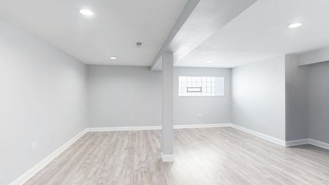 basement with light wood-type flooring