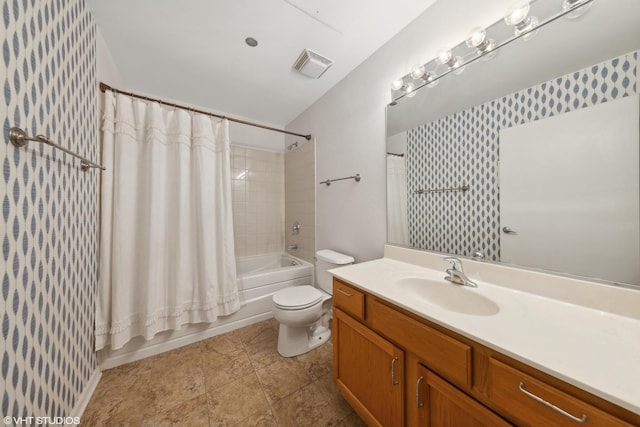 bathroom featuring toilet, visible vents, shower / bath combo with shower curtain, and vanity