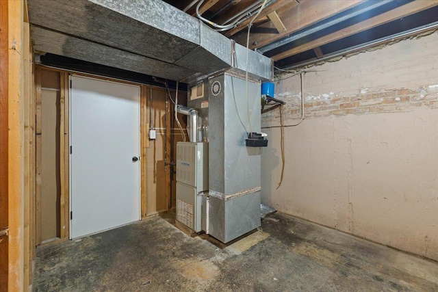 basement featuring heating unit