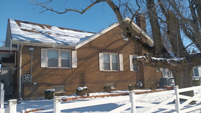 view of snow covered property