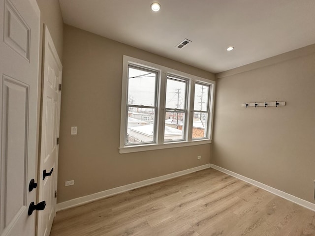 empty room featuring light hardwood / wood-style floors