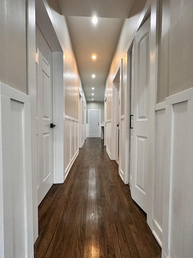 hall featuring dark wood-type flooring